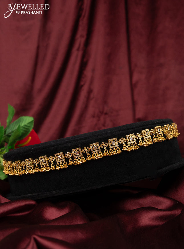 Antique hip chain with cz stones and golden beads hanging