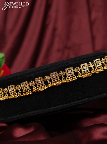 Antique hip chain with cz stones and golden beads hanging