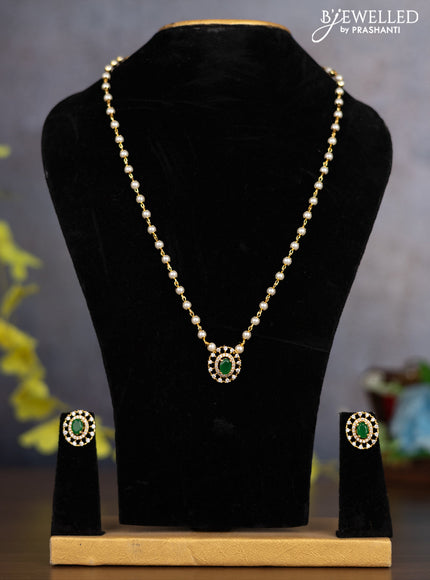 Pearl necklace with emerald and cz stones