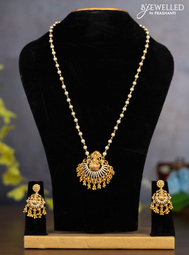 Pearl necklace lakshmi pendant with kemp & cz stones and golden beads hanging