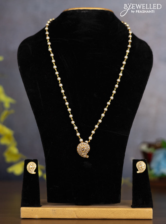 Pearl necklace with manga pendant and cz stones