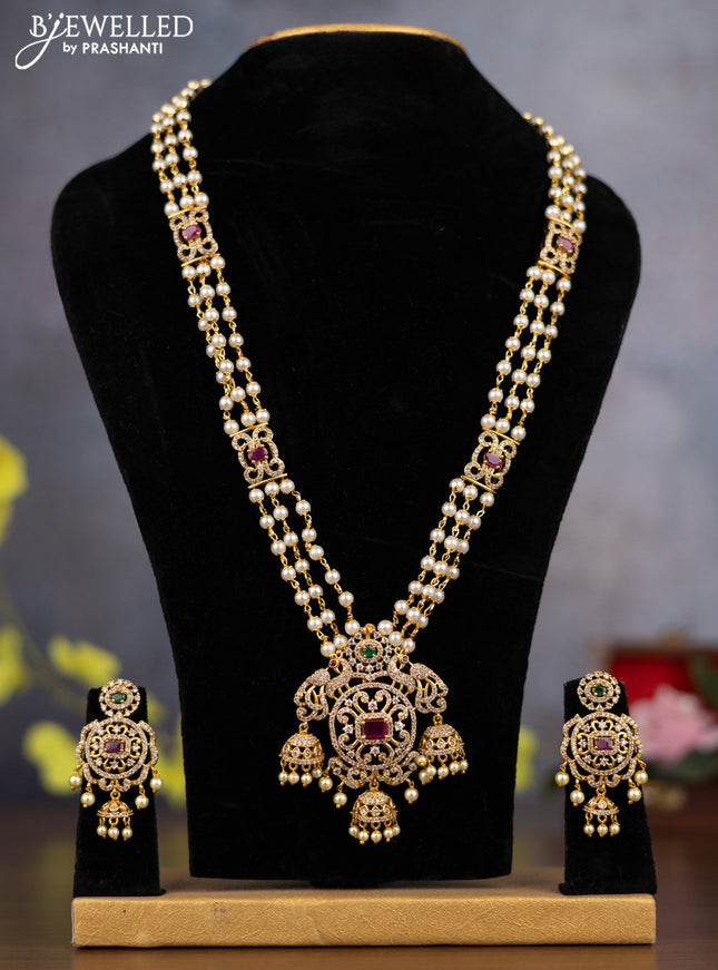 Pearl triple layer Haaram peacock design with kemp & cz stones and pearl hangings