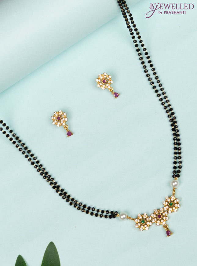 Mangalsutra with floral pendant and kemp & cz stones