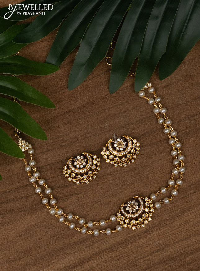 Pearl choker with cz stones