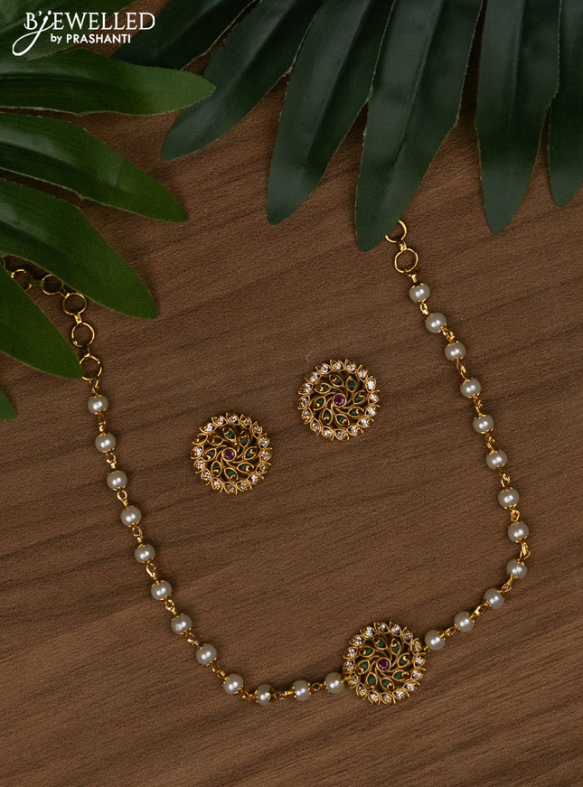 Pearl choker with kemp and cz stones