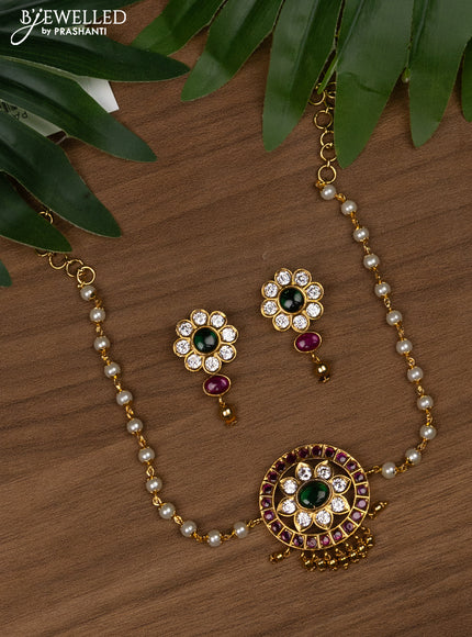 Pearl choker floral design with kemp and cz stones & golden beads hanging