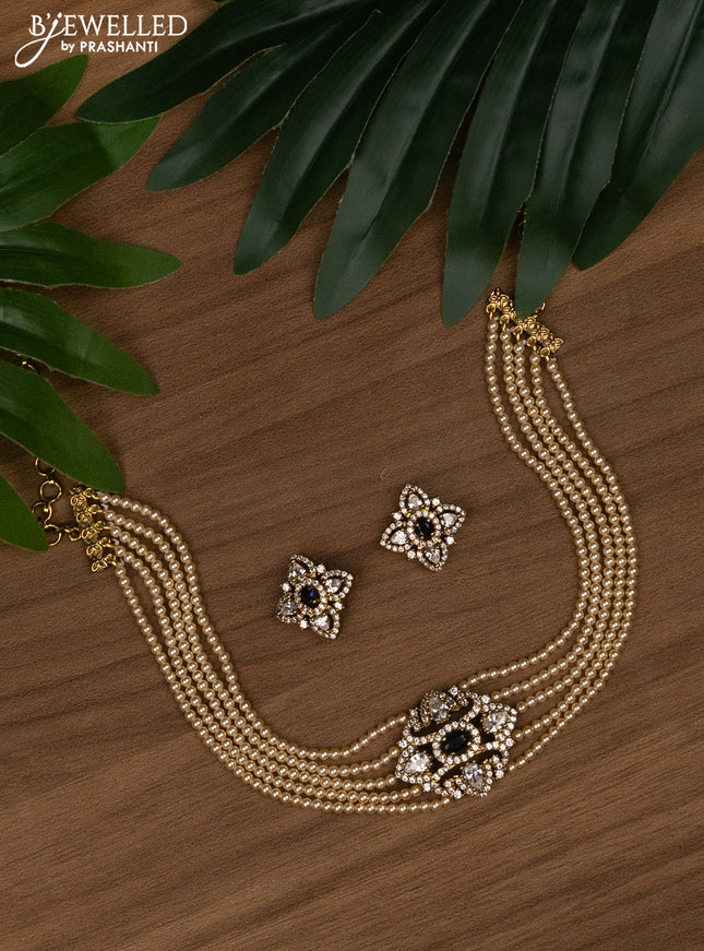 Pearl choker with sapphire and cz stones