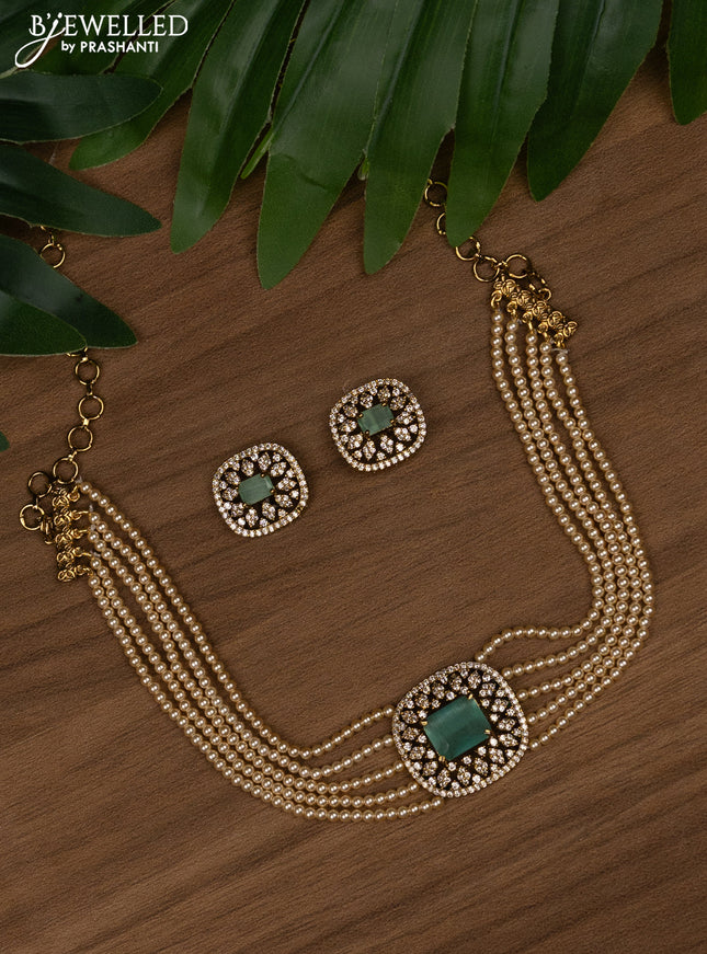 Pearl choker with mint green and cz stones