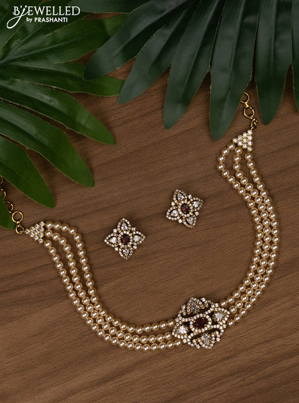 Pearl choker with ruby and cz stones