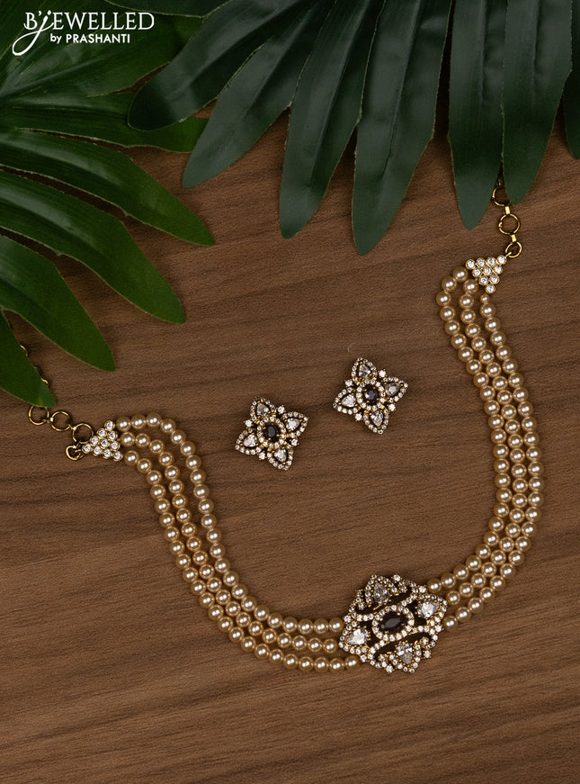 Pearl choker with violet and cz stones