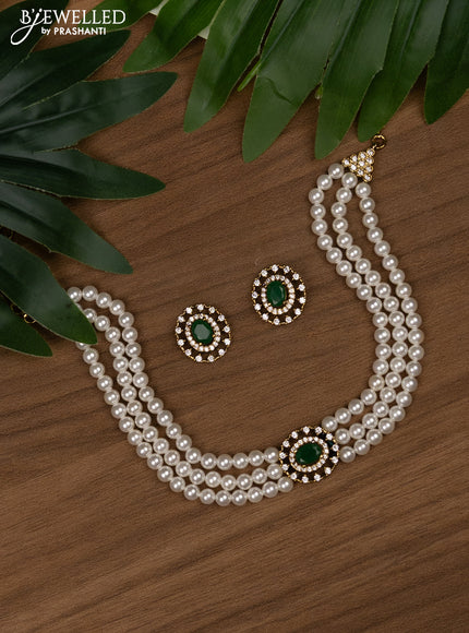 Pearl choker with emerald and cz stones