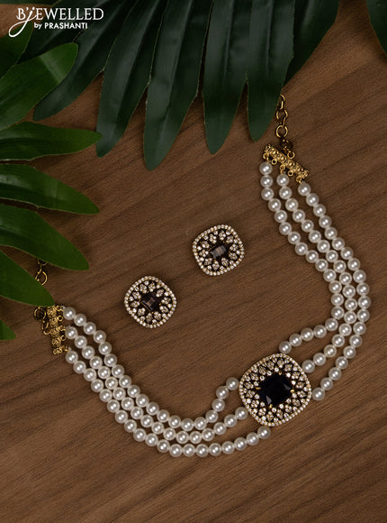 Pearl choker with violet and cz stones