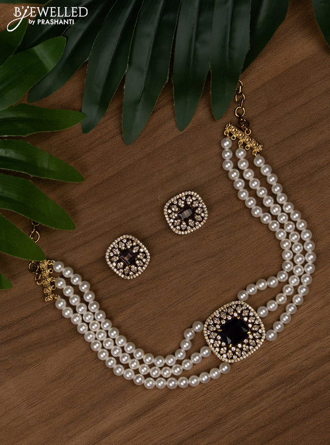 Pearl choker with violet and cz stones