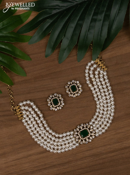 Pearl choker with emerald and cz stones