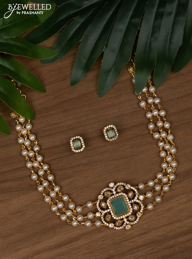 Pearl choker with mint green and cz stones