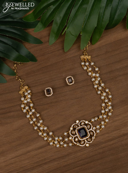 Pearl choker with violet and cz stones