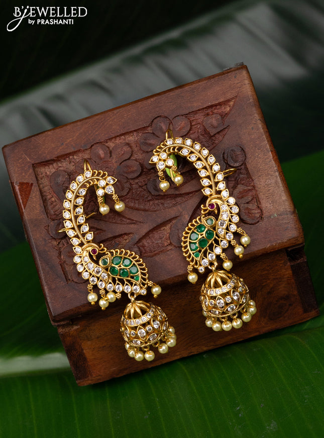 Antique earcuff jhumka peacock design with green kemp & cz stones and pearl hangings