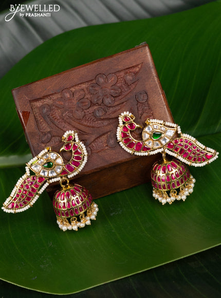 Antique jhumka peacock design with jadau kundan stones and pearl hangings