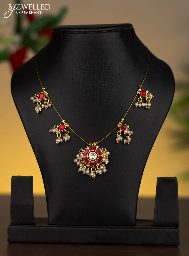 Invisible chain floral pendant with ruby & kundan stones and pearl hangings without earrings