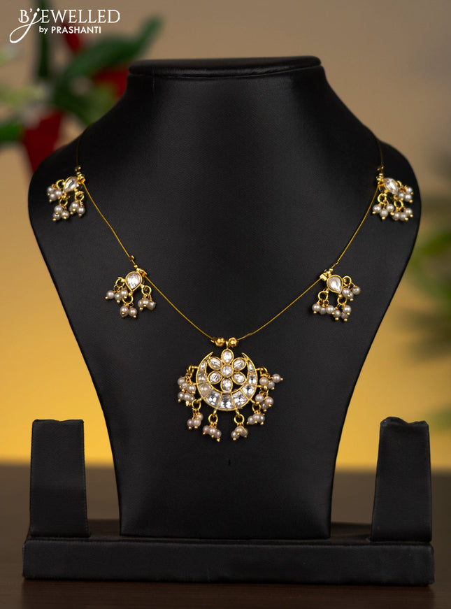 Invisible chain chandbali pendant with kundan stones and pearl hangings without earrings