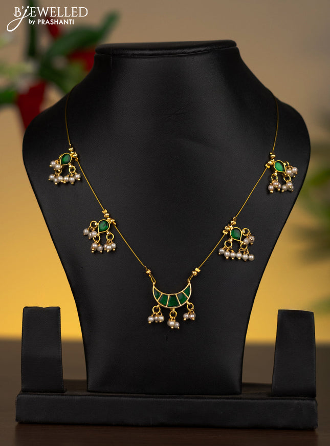 Invisible chain chandbali pendant with emerald stones and pearl hangings without earrings