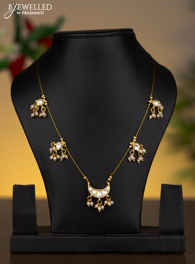 Invisible chain chandbali pendant with kundan stones and pearl hangings without earrings