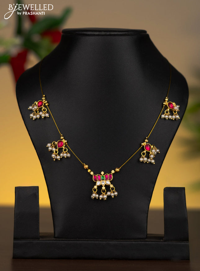 Invisible chain lotus pendant with kemp & kundan stones and pearl hangings without earrings