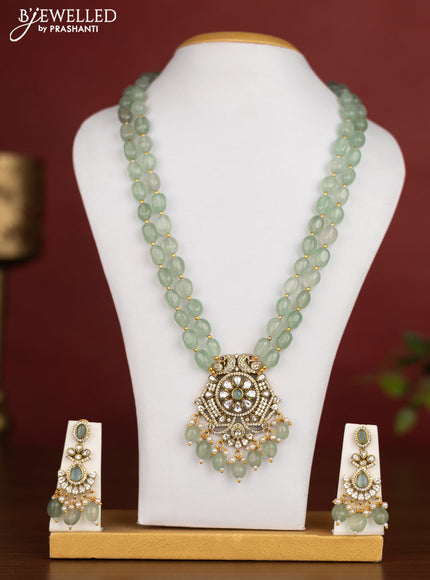 Beaded double layer mint green necklace with kundan & cz stones and pearl & beads hanging in victotrian finish