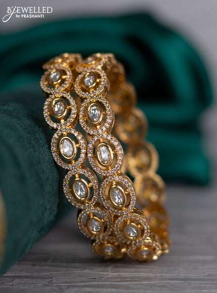 Zircon bangle with kundan and cz stones in gold finish