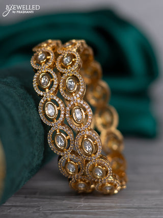 Zircon bangle with kundan and cz stones in gold finish