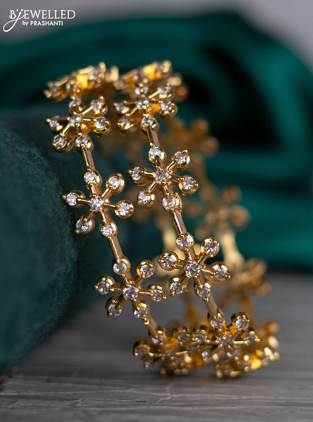Zircon bangle with cz stones in gold finish