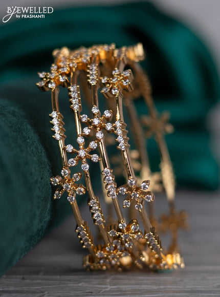 Zircon bangle with cz stones in gold finish