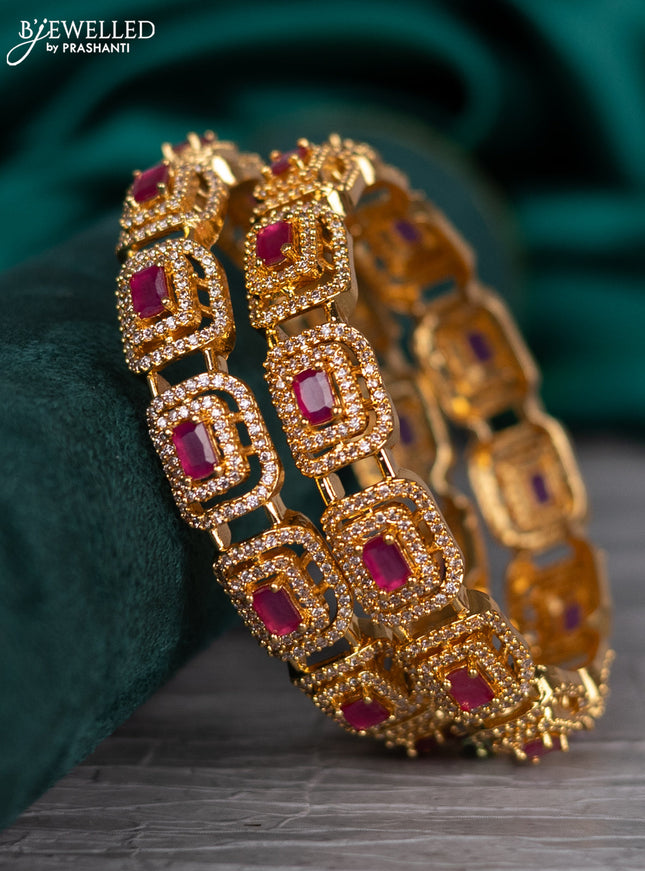 Zircon bangle with ruby and cz stones in gold finish