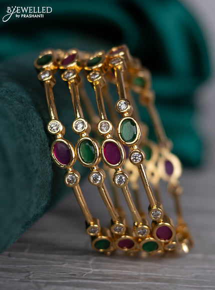 Zircon bangle with kemp and cz stones in gold finish