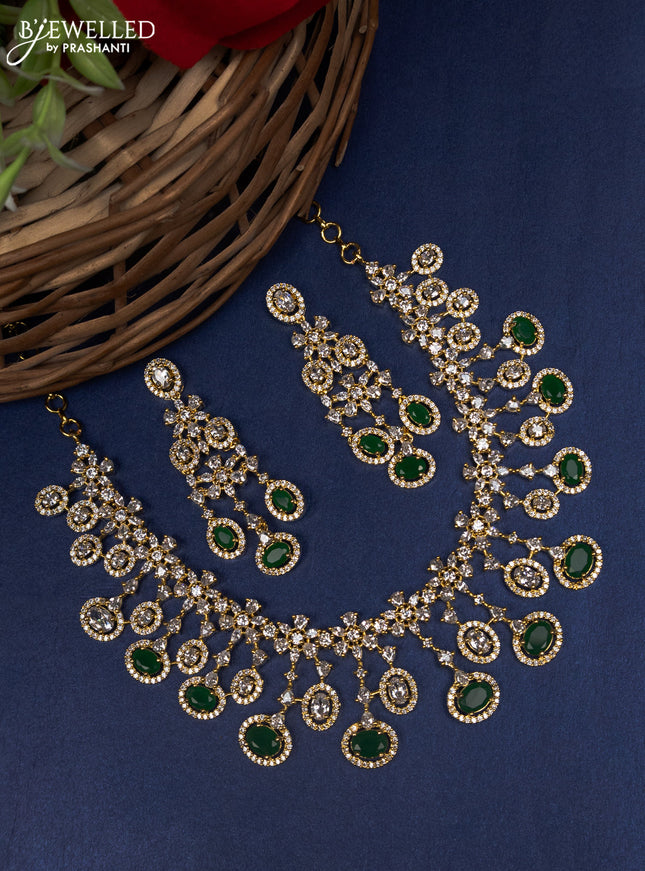 Zircon choker with emerald and cz stones in gold finish