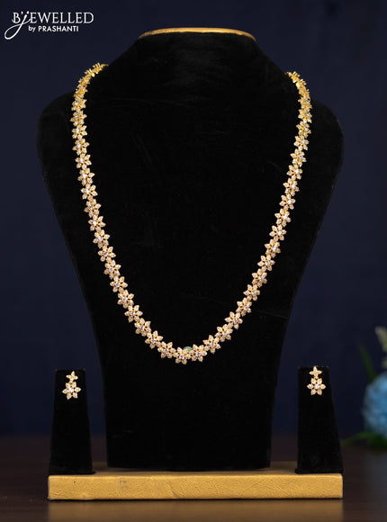 Zircon haaram floral design with cz stones in gold finish