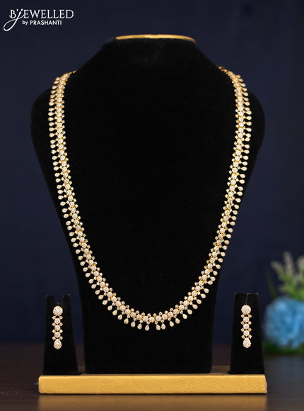 Zircon haaram with cz stones in gold finish