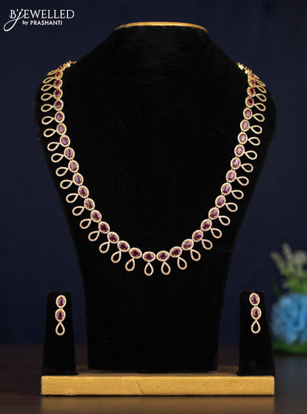 Zircon haaram with ruby and cz stones in gold finish