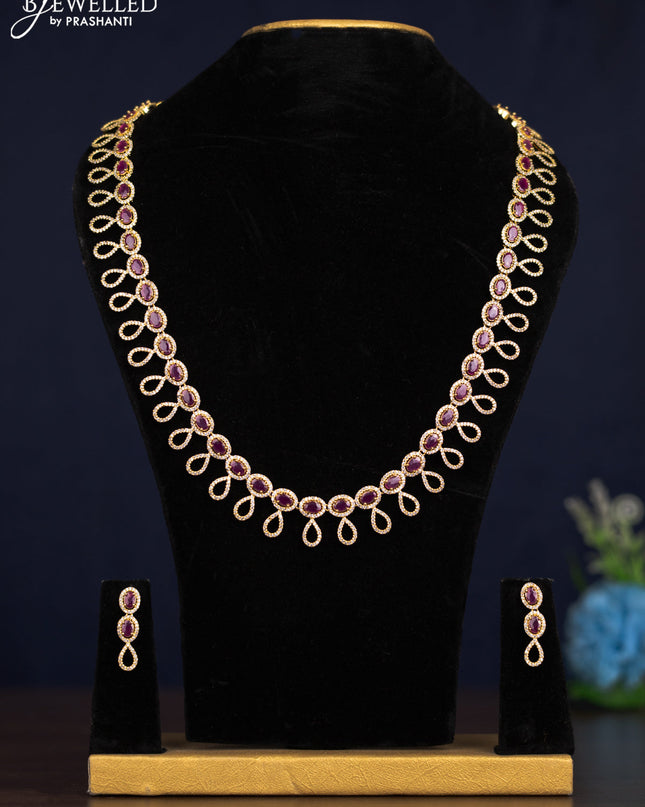 Zircon haaram with ruby and cz stones in gold finish