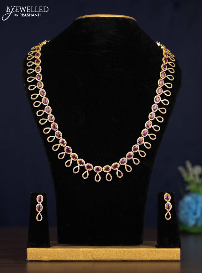 Zircon haaram with ruby and cz stones in gold finish