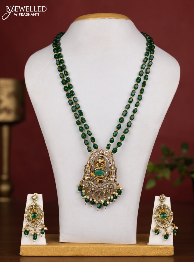 Beaded double layer green necklace ganesha pendant with emerald & cz stones and pearl & beads hanging in victorian finish