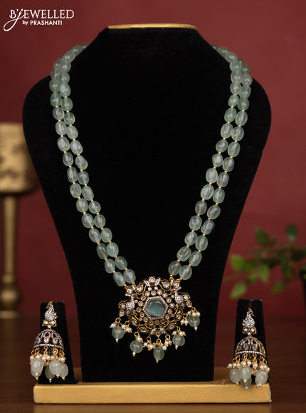 Beaded double layer mint green necklace with cz stones and pearl & beads hanging in victorian finish