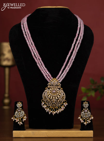 Beaded triple layer baby pink necklace with cz stones and pearl & beads hanging in victorian finish