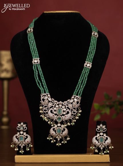Beaded triple layer mint green necklace with kundan & cz stones and pearl & beads hanging in victorian finish