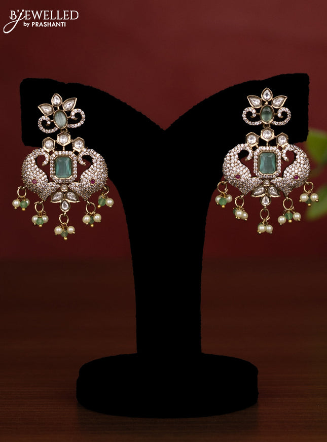 Beaded triple layer mint green necklace with kundan & cz stones and pearl & beads hanging in victorian finish