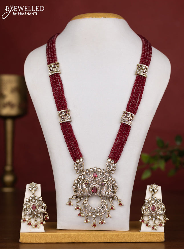 Beaded multilayer maroon necklace peacock design with ruby kundan & cz stones and pearl & beads hanging in victorian finish