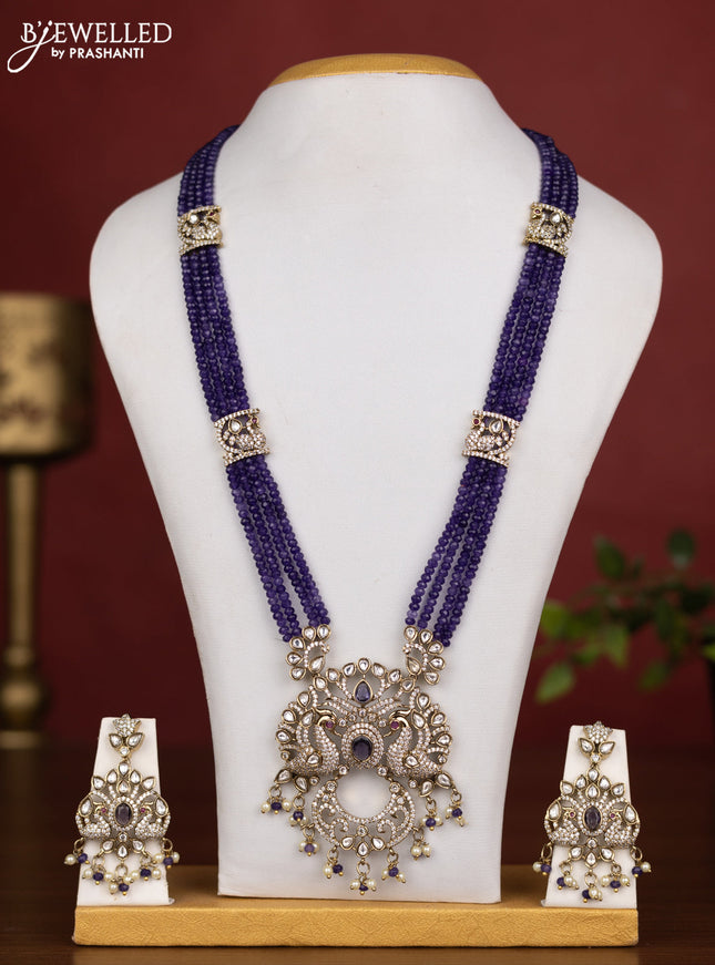 Beaded multilayer violet necklace peacock design with kundan & cz stones and pearl & beads hanging in victorian finish
