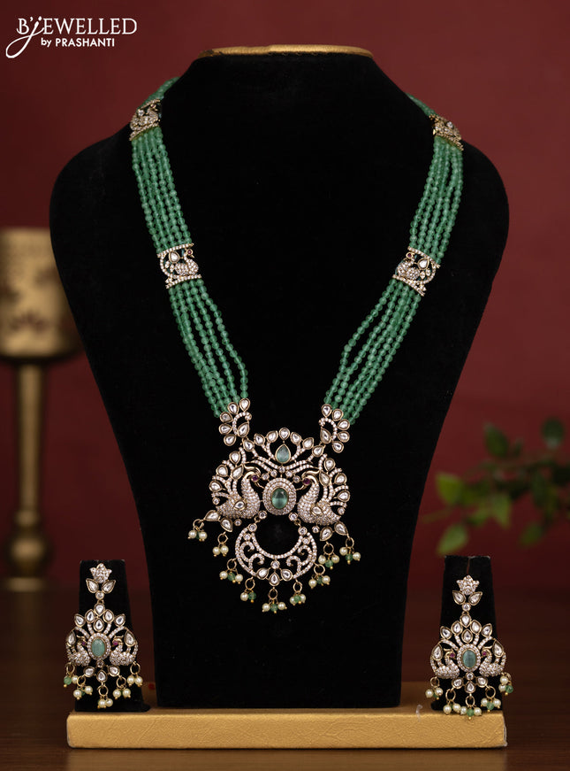 Beaded multilayer baby pink necklace peacock design with kundan & cz stones and pearl & beads hanging in victorian finish