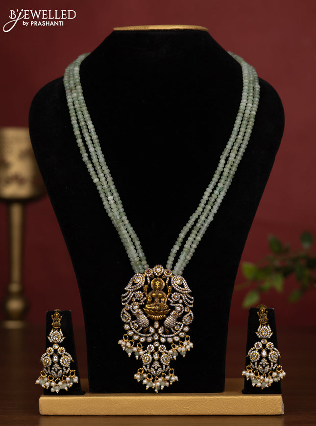 Beaded triple layer mint green necklace lakshmi pendant with kundan & cz stones and pearl & beads hanging in victorian finish
