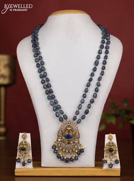 Beaded double layer blue necklace ganesha pendant with sapphire & cz stones and pearl & beads hanging in victorian finish